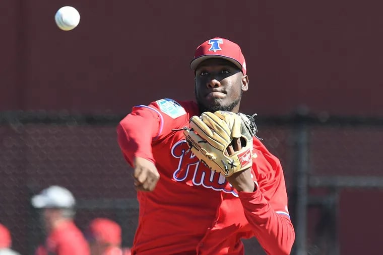 Phillies pitcher Enyel De Los Santos throws during a spring training workout at Spectrum Field in Clearwater, Fla.
