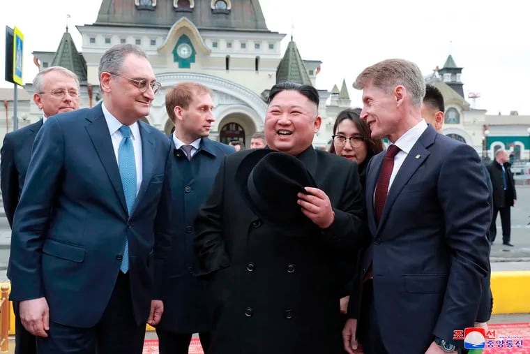 In this Wednesday, April 24, 2019, photo, North Korean leader Kim Jong Un (center) is welcomed by Russian officials on his arrival in Vladivostok, Russia. The content of this image is as provided and cannot be independently verified. Korean language watermark on image as provided by source reads: "KCNA" which is the abbreviation for Korean Central News Agency. (Korean Central News Agency / Korea News Service via AP)