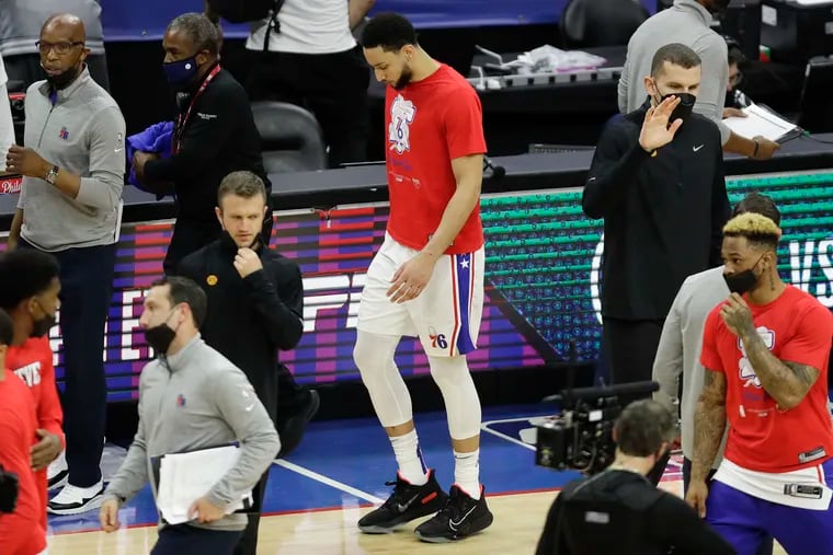 Ben Simmons walks off the court after losing Game 7 to Atlanta on Sunday.