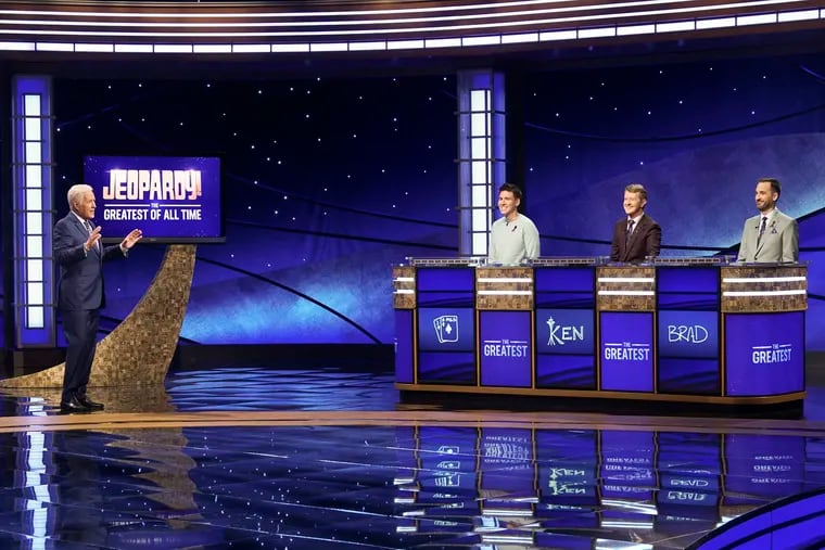 "Jeopardy!" host Alex Trebec (left) appears with contestants James Holzhauer, Ken Jennings and Brad Rutter during the first night of the show's Greatest of All Time tournament, which kicked off Tuesday night.