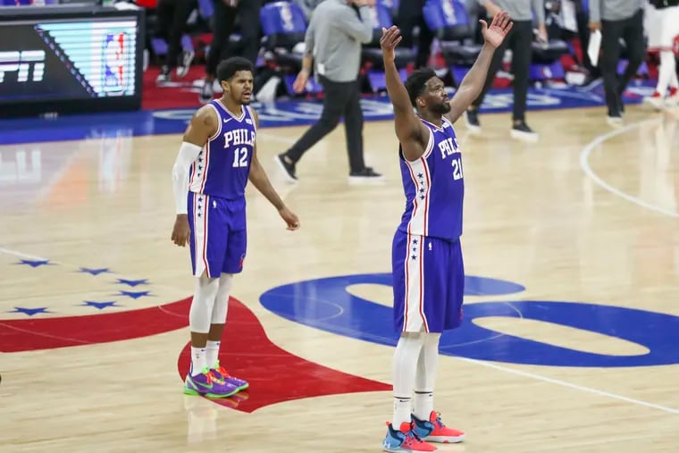 Joel Embiid (right) is on his way to an MVP season, averaging more than 30 points and 11 rebounds per game for the first-place Sixers.