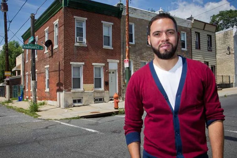 Juan Sosa and his father have bid at auction and won several properties in North Philadelphia. ( ALEJANDRO A. ALVAREZ / Staff Photographer )