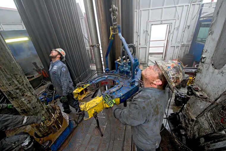 Workers drill a shale-gas well in Loyalsock State Forest in 2013.