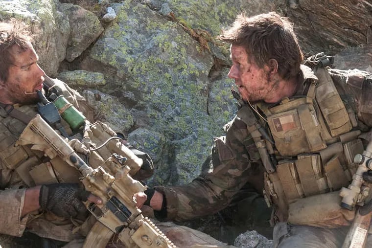 The way a key decision was made in reel life strayed from real life. Here, Taylor Kitsch as Michael Murphy (left) and Mark Wahlberg as Marcus Luttrell.