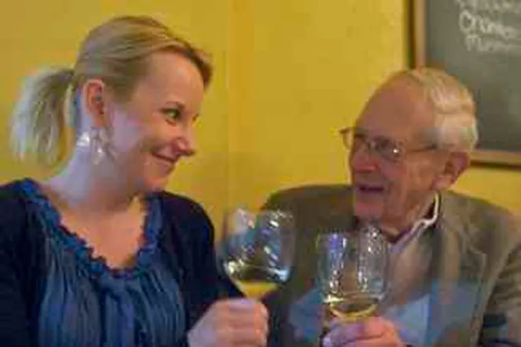 Edgar Weinrott enjoying his 19th meal at A la Maison, with general manager Lori Sexton.