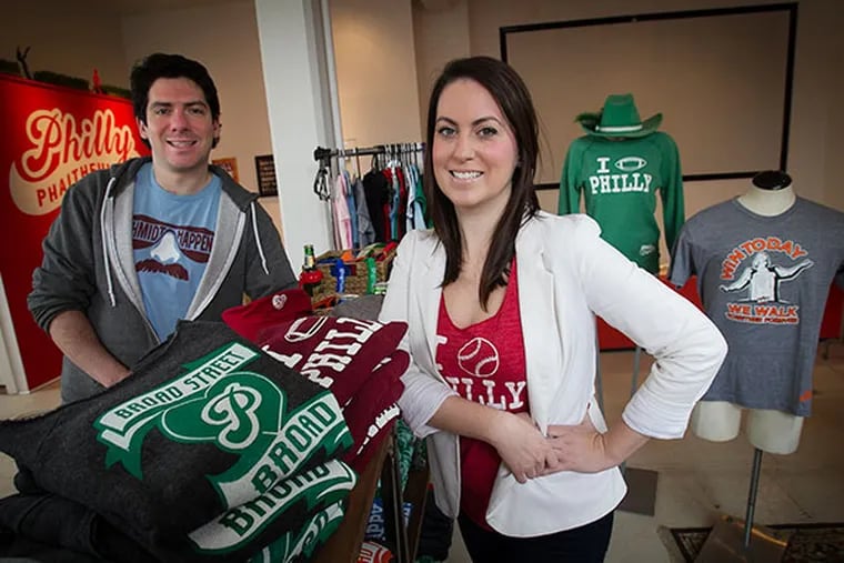 Christine Blechman, owner of Broad St. Broad, and boyfriend Dan Hershberg, owner of Philly Phaithful at their business, April 11, 2014. ( ALEJANDRO A. ALVAREZ / STAFF PHOTOGRAPHER )