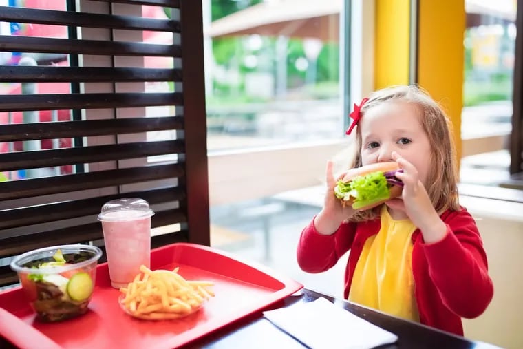 A new law passed by City Council requires that restaurants offer water, juice, or milk as their default drink option for kids' meals, as opposed to soda.
