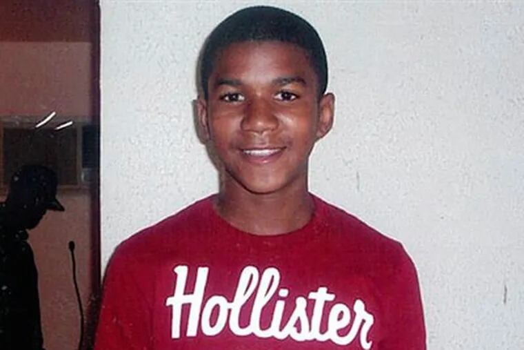 This undated file family photo shows Trayvon Martin. Martin was slain in the town of Sanford, Fla., on Feb. 26 in a shooting that has set off a nationwide furor over race and justice. Neighborhood crime-watch captain George Zimmerman claimed self-defense and has not been arrested, though state and federal authorities are still investigating. Since the slaying, a portrait has emerged of Martin as a laid-back young man who loved sports, was extremely close to his father, liked to crack jokes with friends and, according to a lawyer for his family, had never been in trouble with the law. (AP Photo/Martin Family, File)