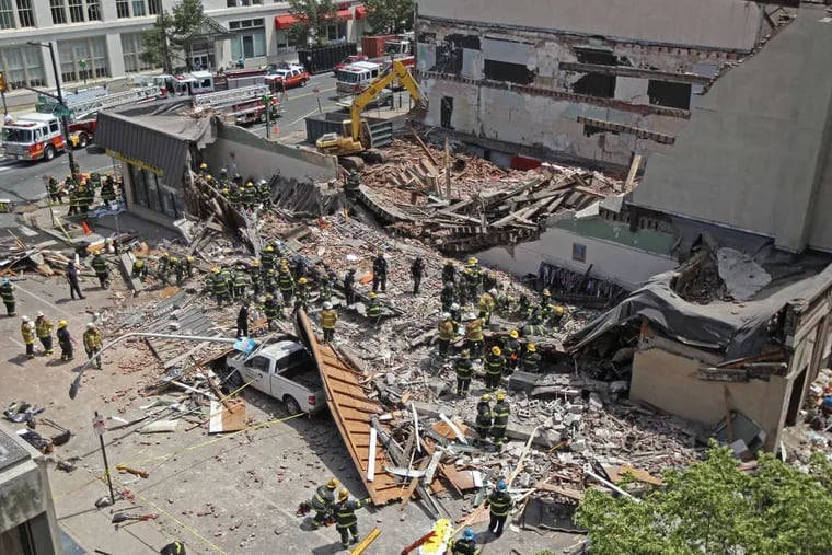 The 2100 block of Market Street after the building collapse that leveled a thrift store and killed six in June 2013. Brandywine Realty Trust plans to develop the site into lofts, shops, and offices.