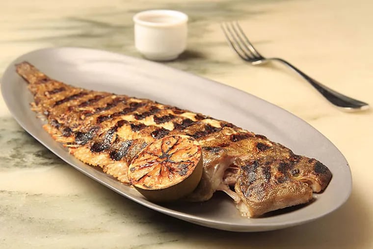 The grilled whole Dover sole at a.kitchen, served bone-in over brown butter-lime vinaigrette, may present a challenge for some diners, but it's worth it.