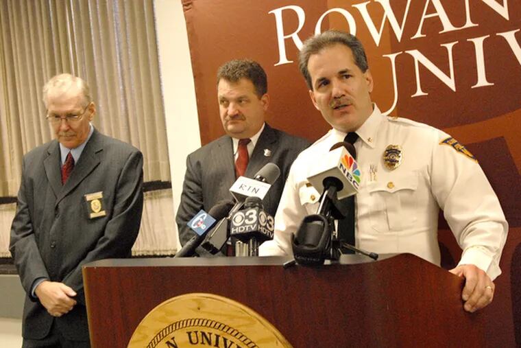 Glassboro Police Chief Alex Fanfarillo announces the arrests of three suspects in three armed robberies at Rowan University. With him are (at left) Timothy Michener, Rowan&#0039;s assistant vice president for public safety, and Gloucester County Chief of Detectives Thomas Sullivan.