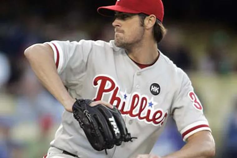 Cole Hamels allowed five hits and struck out five batters in his fifth career complete game. (Lori Shepler/AP)