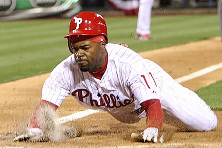 Jimmy Rollins scores on a Hunter Pence base hit during the third inning. (Steven M. Falk/Staff Photographer)