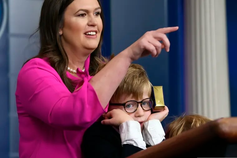 White House press secretary Sarah Sanders, standing next to her son Huck Sanders, calls on a child during a briefing at the White House in Washington, Thursday, April 25, 2019. Children of journalists and White House staff were invited to attend the briefing and ask Sanders questions.