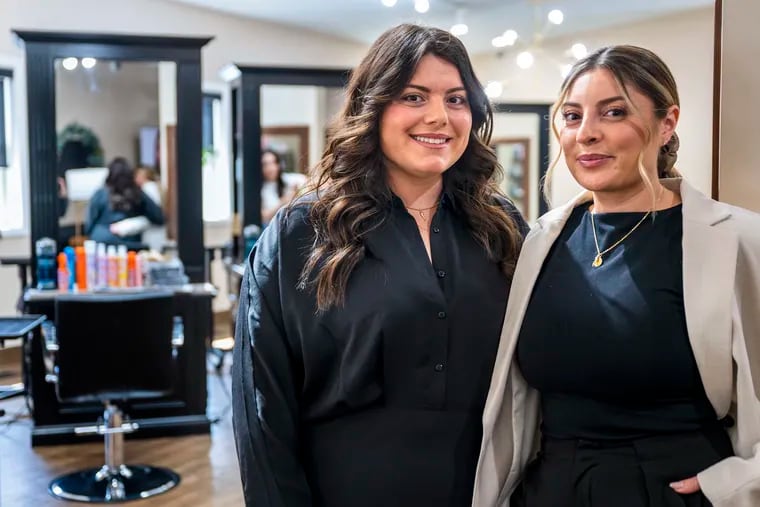 Sisters and salon professionals Christina Giordano (left) and Jamie Giordano inside their Salon G on the 600 block of West Collings Avenue in Collingswood. They say they need the free parking spots for their customers.