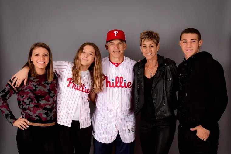 Joe Girardi (center) with his daughters Serena and Lena, his wife Kim, and son Dante.