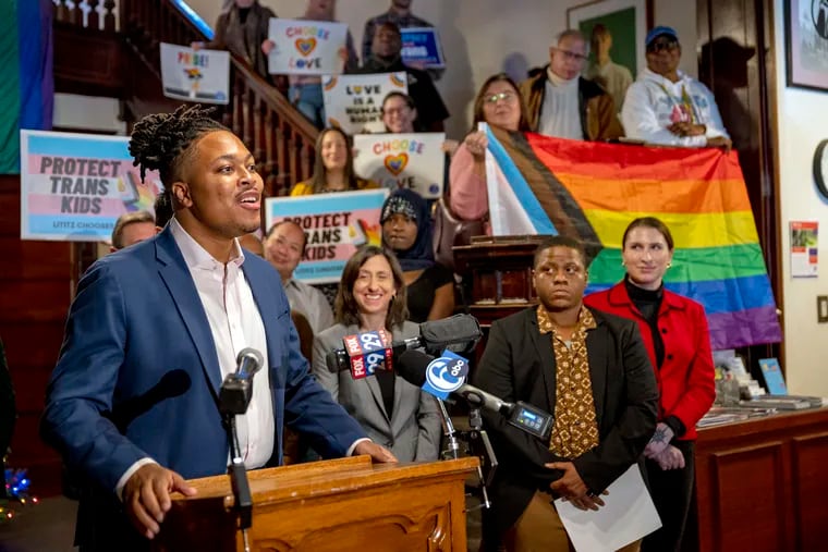 State Rep. Malcolm Kenyatta speaks at a press conference at the William Way Center Tuesday as Democratic lawmakers and advocates call for the passage of a slate of bills protecting LGBTQ+ students in Pennsylvania schools.
