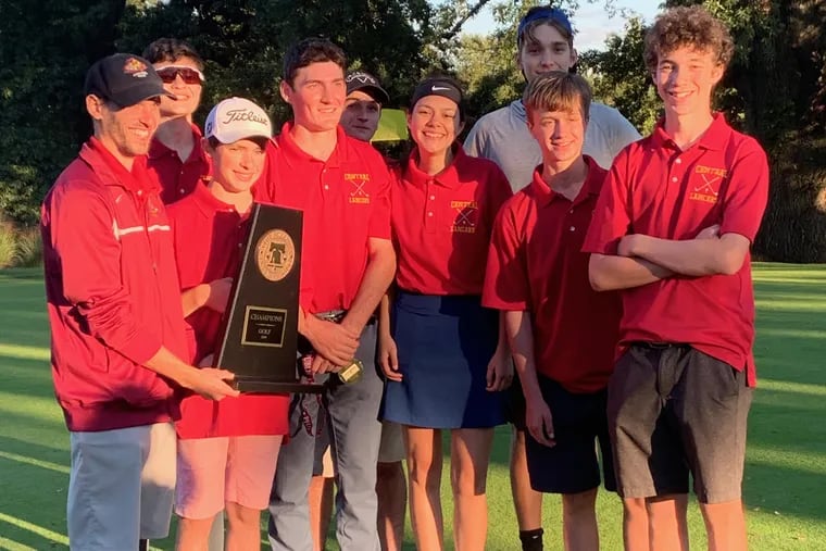 The Central boys' soccer team celebrates a Public League Golf Championship title on October 4, 2019.