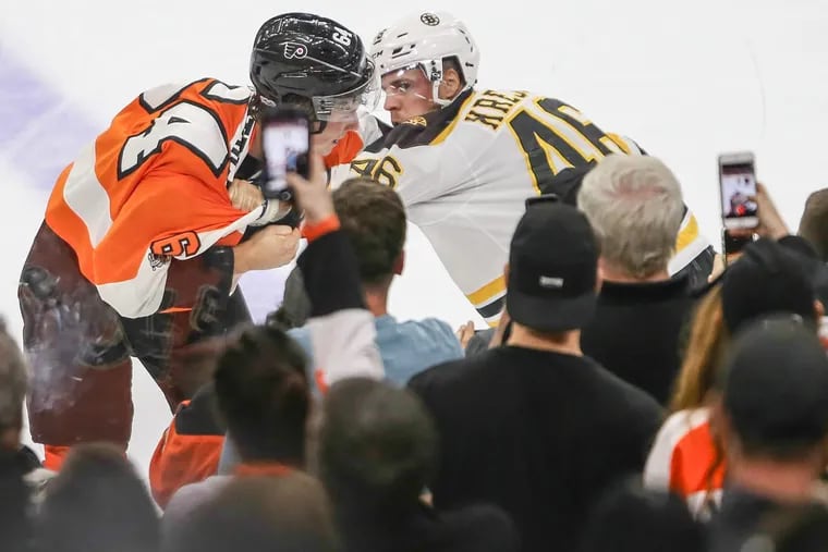 Nolan Patrick fights with Boston’s David Krejci during a preseason game.