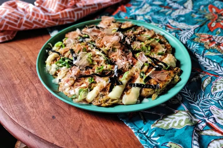 Japan's okonomiyaki is an infinitely creative dish that can be made with whatever you have on hand. Scrapple adds a subtle savory-salty quality to this filling all-day dish.