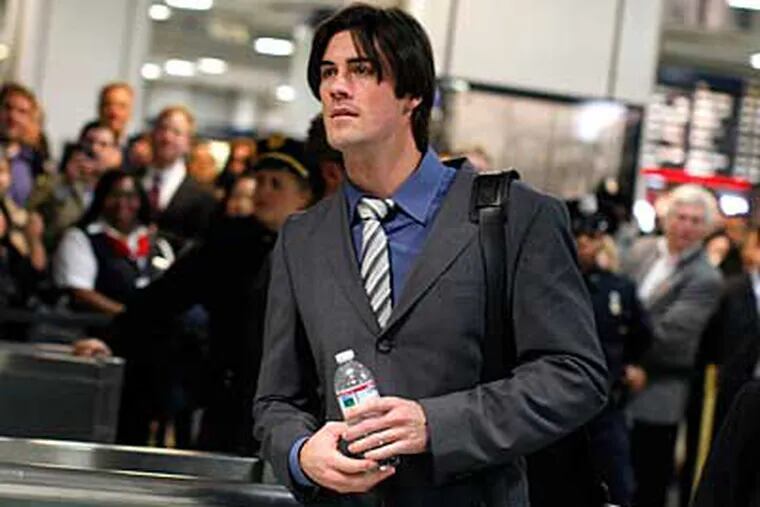 Phillies starter Cole Hamels arrives at Penn Station Tuesday afternoon. (AP Photo/Jason DeCrow)