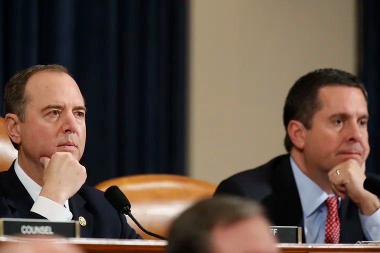 House Intelligence Committee Chairman Rep. Adam Schiff, D-Calif., left, and ranking member Rep. Devin Nunes, D-Calif., look on during a hearing of the House Intelligence Committee on Capitol Hill in Washington, Wednesday, Nov. 13, 2019, during the first public impeachment hearing of President Donald Trump's efforts to tie U.S. aid for Ukraine to investigations of his political opponents. (AP Photo/Alex Brandon)