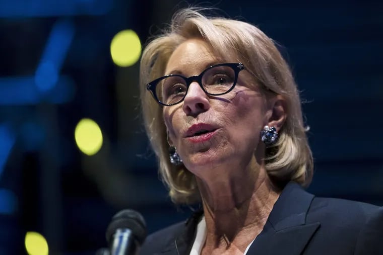 In this Sept. 17, 2018 photo, Education Secretary Betsy DeVos speaks during a student town hall at National Constitution Center in Philadelphia. Education Secretary Betsy DeVos is proposing a major overhaul to the way colleges handle complaints of sexual misconduct. The Education Department released a plan Friday that would require schools to investigate sexual assault and harassment only if it was reported to certain campus officials and only if it occurred on campus or other areas overseen by the school.