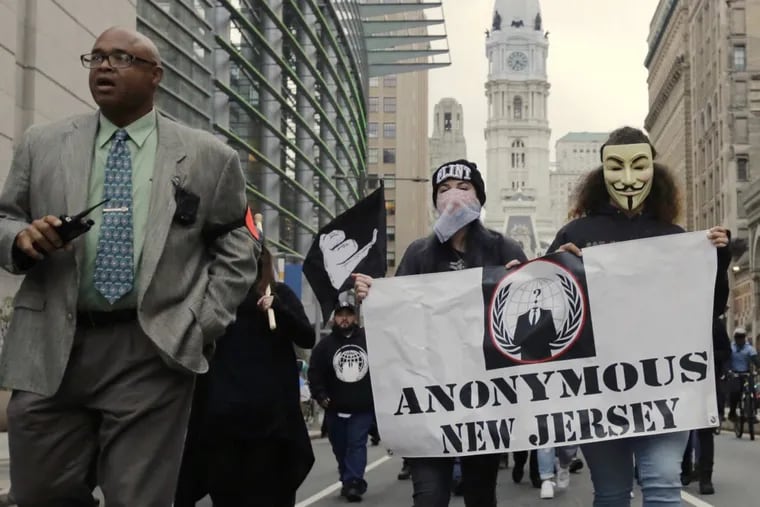 Marchers on North Broad St in Philadelphia during the Anonymous, Million Mask March on Sunday, November 5, 2017.