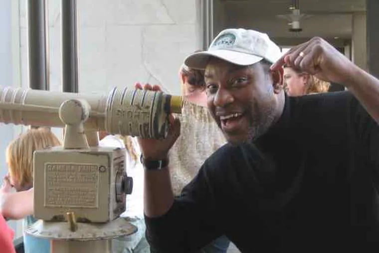 Speaking of Franklins: The institute's chief astronomer, Derrick Pitts, tries out a 25-cent telescope at a shopping center while visiting Los Angeles. He was there last week to talk about Galileo on CBS's &quot;The Late Late Show.&quot;