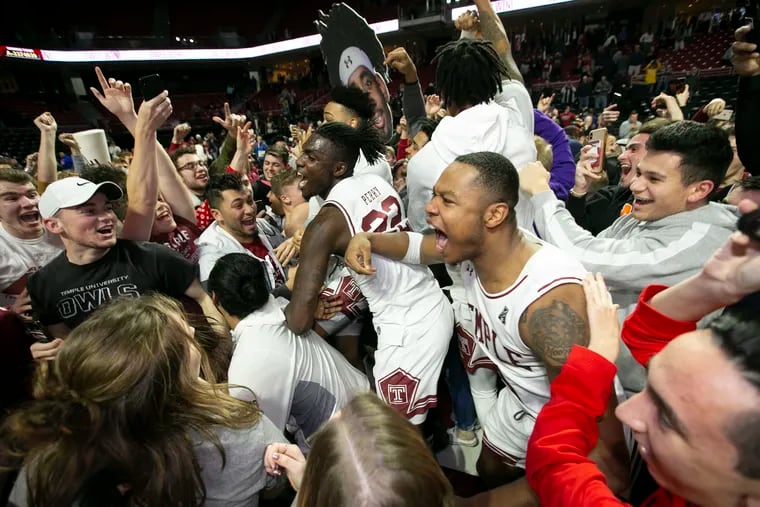Temple's J.P. Moorman (foreground) celebrated after Temple beat Wichita State last season.