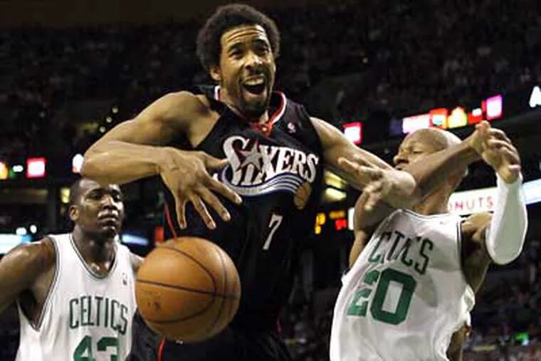 Andre Miller has the ball knocked loose as he goes to the hoop against Boston Celtics guard Ray Allen (20) and Boston Celtics center Kendrick Perkins (43) in the second half of the Celtics' 110-91 win on Tuesday. (AP Photo / Elise Amendola)
