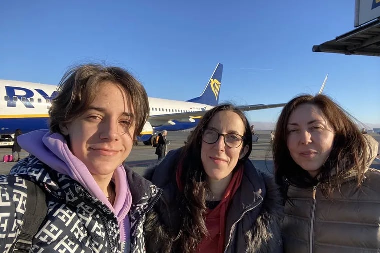 Yuliia Sachuk (center), director of the Ukrainian disabled advocacy group Fight For Right, shortly after arriving in Denmark from her home country with her son, Taras (left) and sister, Olena.