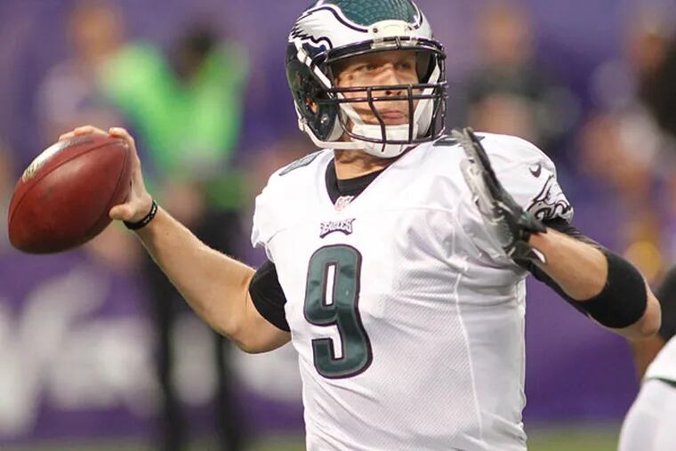 Eagles quarterback Nick Foles throws a pass during the first half of an NFL football game against the Minnesota Vikings, Sunday, Dec. 15, 2013, in Minneapolis. (Andy King/AP)