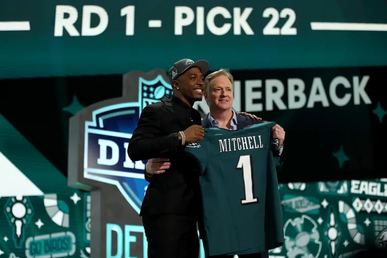 Quinyon Mitchell (left) is the first defensive back picked by the Eagles in the first round since 2002.