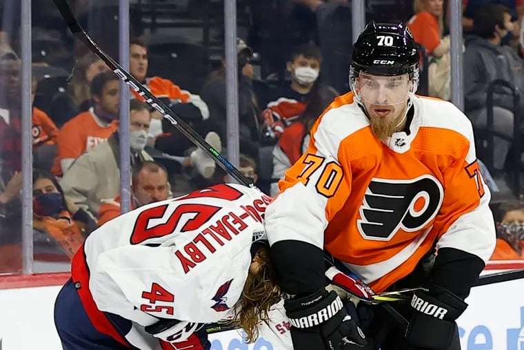 Flyers defenseman Rasmus Ristolainen, shown shoving Washington Capitals forward Axel Jonsson-Fjallby during a preseason game, has given his team much-needed physical play.