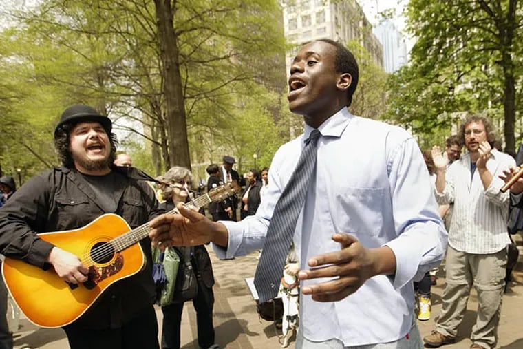 Singer Anthony Riley (center, 2007) made his name as a street performer before his fame on “The Voice.” He says he’s completed rehab since leaving the show. (JESSICA GRIFFIN / File)