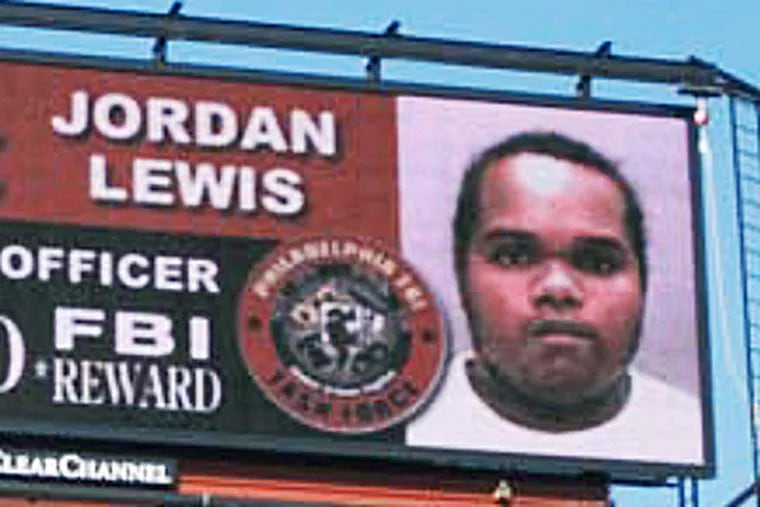 An electronic billboard in Philadelphia featured John "Jordan" Lewis, later sentenced to death in the killing of Police Officer Charles Cassidy.