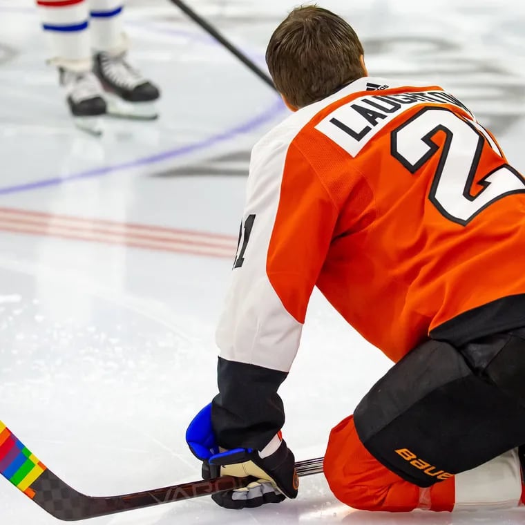 Flyers' Scott Laughton, pictured before the Pride Night game this season against the Canadiens, is involved with several LGBTQ+ organizations and an ally to the community.