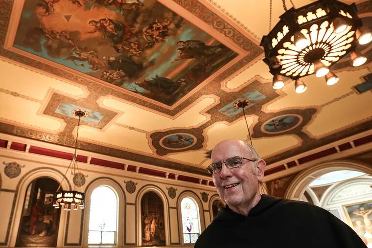 The Rev. Bill Waters at St. Augustine Roman Catholic Church, whose frescoes are the oldest of their kind in this country, dating to the 1840s. The Philadelphia Historical Commission has unanimously designated the works as historic. (STEVEN M. FALK / Staff Photographer)