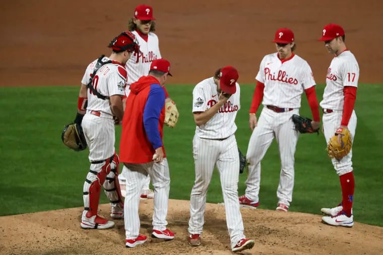Phillies starter Aaron Nola is pulled from the game at the top of the fifth inning. After loading the bases, he was relieved by José Altuve, who hit Yordan Alvarez with the first pitch he threw.