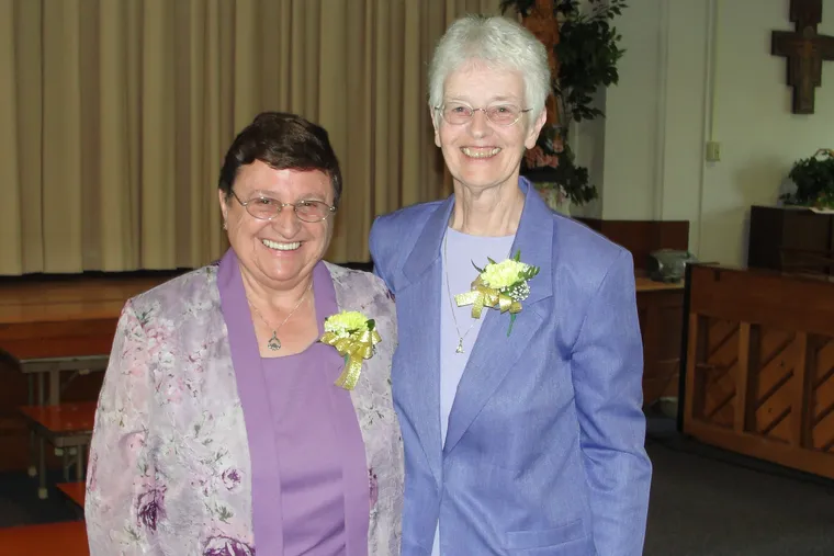 Sister Carmel (right) stands with Sister Mary Griffin in 2012 as they celebrate 50 years of faith. They both professed their vows in 1962 and came to the United States from Ireland.