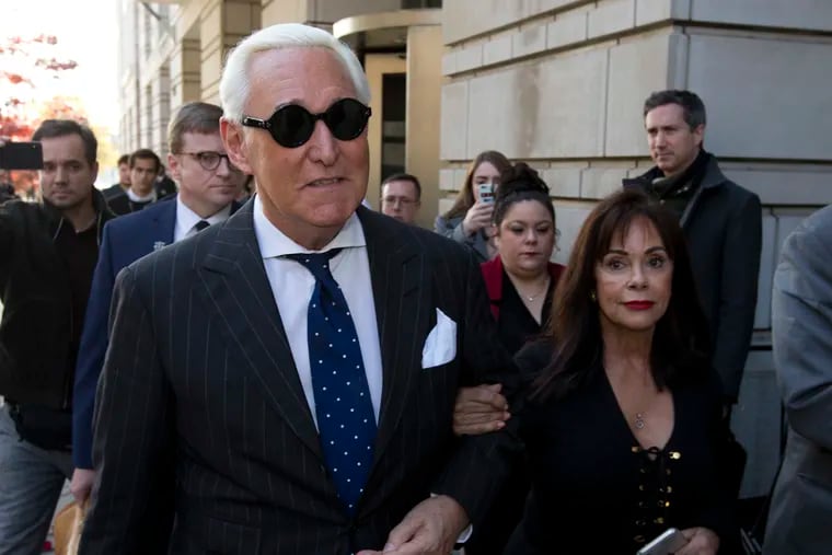 Roger Stone, left, with his wife Nydia Stone, leaves federal court in Washington in November.