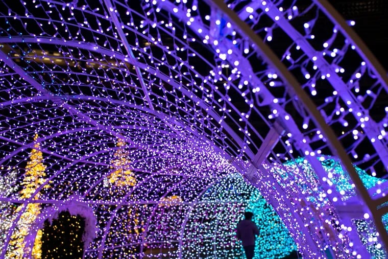The parking lot surrounding the Wells Fargo Center turns into a festive showcase of light structures, festive displays and more for Winter on Broad Street.