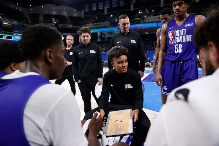 Former Temple star Candice Dupree, who is now part of the NBA's Assistant Coaches Program, draws up a play at the NBA draft combine.