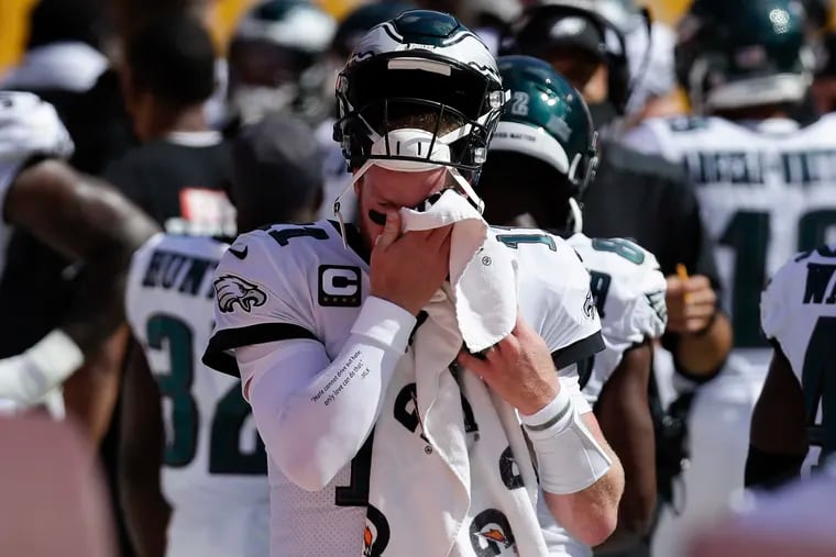 Carson Wentz was under pressure much of the game Sunday in the Eagles' come-from-ahead loss to Washington.