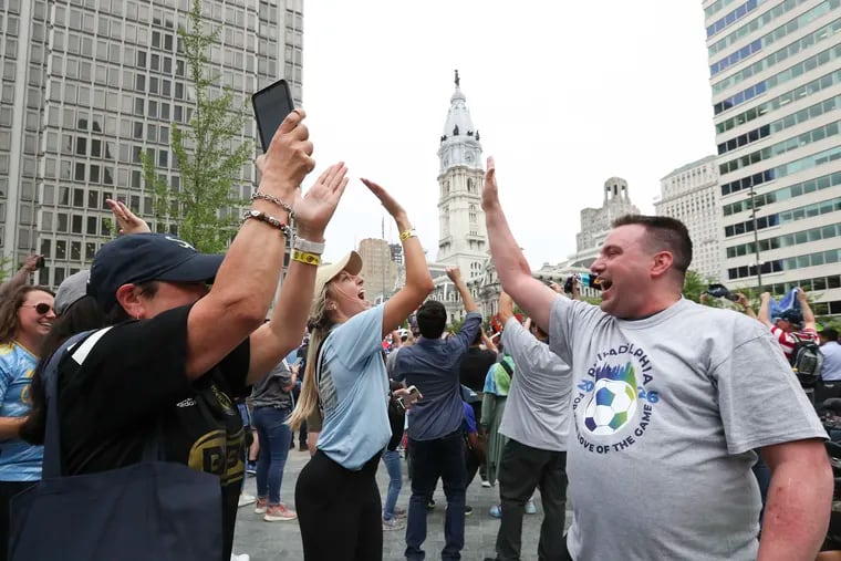 Fans celebrate Philadelphia being named a 2026 World Cup host city at LOVE Park on Thursday.