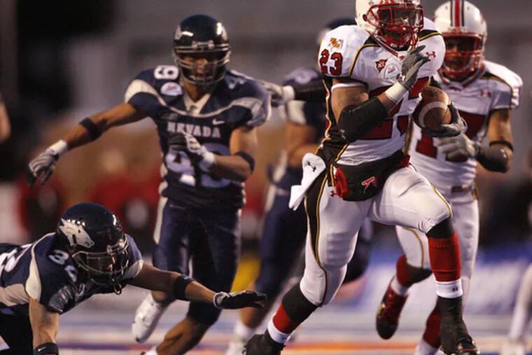 Former Plymouth Whitemarsh star Da&#0039;Rel Scott runs for a score for Maryland in the Humanitarian Bowl against Nevada.