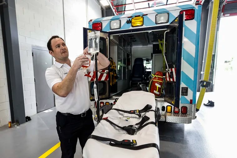 Brad Cosgrove, director and chief of emergency medical services for TowerDIRECT, sets up a demo practice blood unit in Phoenixville.