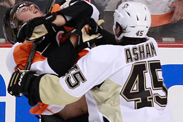Penguins forward Arron Asham faces possible suspension after giving Brayden Schenn a cross-check to the throat. (Ron Cortes/Staff Photographer)