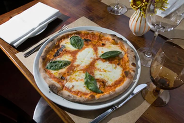 The Margherita pizza at Marc Vetri&#0039;s new restaurant, Osteria, which is already luring well-heeled foodies to an area they might once have avoided.